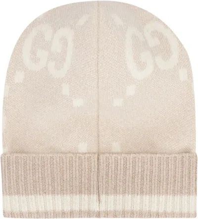 Shop Gucci Knitted Beanie In Sand