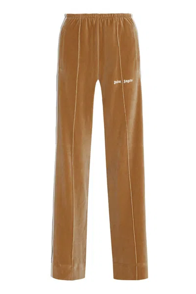 Shop Palm Angels Velvet Trousers In Beige