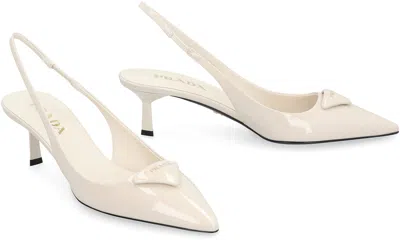 Shop Prada Patent Leather Slingback Pumps In Ivory