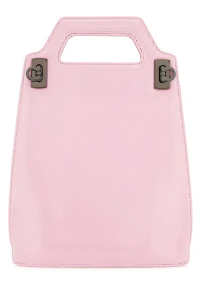 Shop Ferragamo Salvatore  Handbags. In Pink