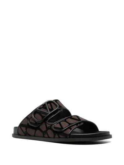 Shop Valentino Garavani Vlogo Toile Iconographe Sandals In Marrone Scuro