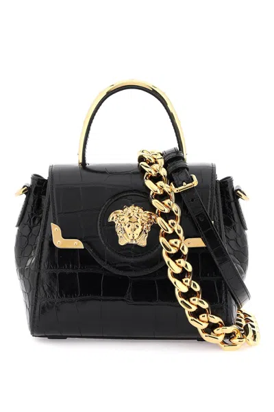 Shop Versace Small Handbag The Jellyfish In Black  Gold (black)