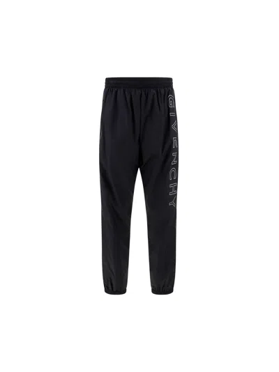 Shop Givenchy Nylon Joggers With Logo In Black