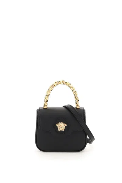 Shop Versace Leather La Medusa Mini Bag In Black