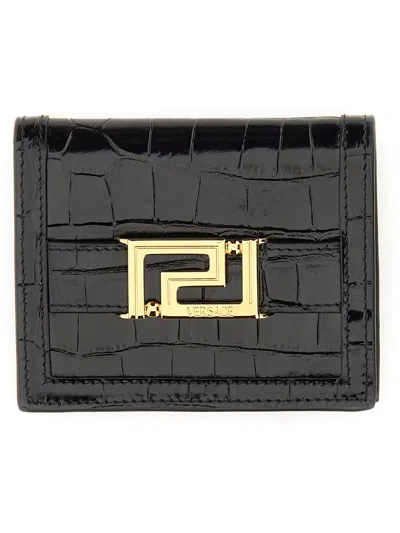 Shop Versace Greca Goddess Embossed Bi-fold Wallet In Nero