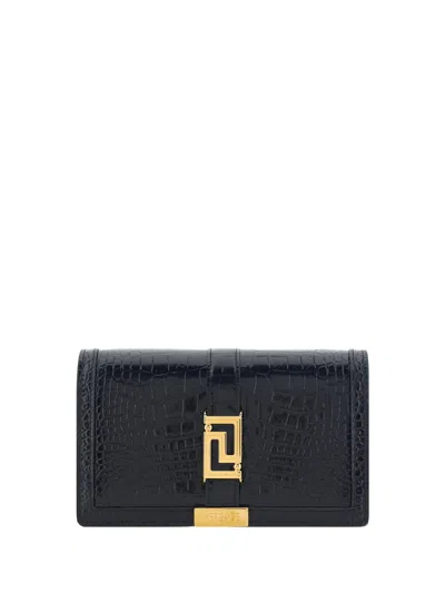 Shop Versace Mini Greca Goddess Bag In Nero/oro