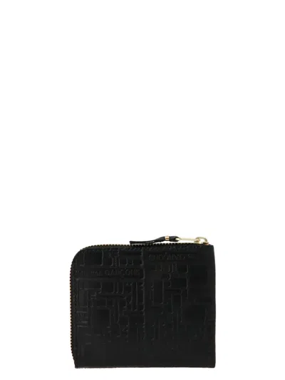 Shop Comme Des Garçons 'embossed Logotype' Wallet In Black