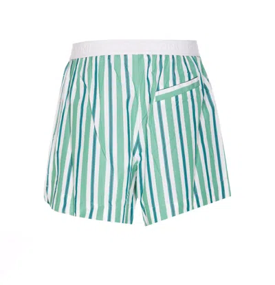 Shop Ganni Shorts In Green