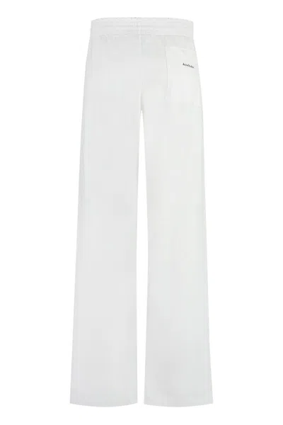 Shop Acne Studios Cotton Trousers In White