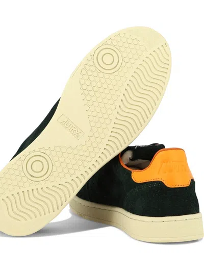 Shop Autry "med Low" Sneakers In Green