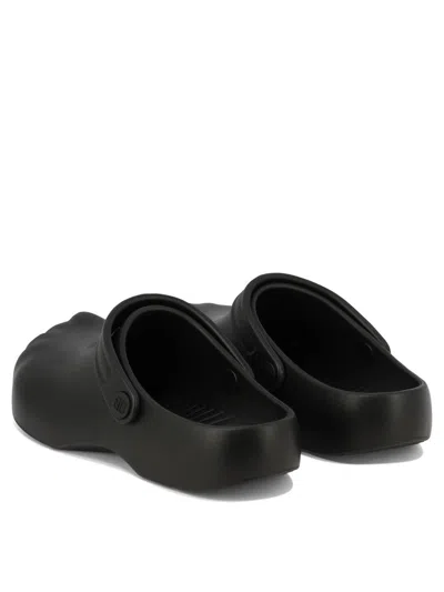 Shop Balenciaga "sunday Molded" Slippers In Black