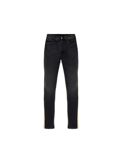 Shop Palm Angels Jeans In Nero