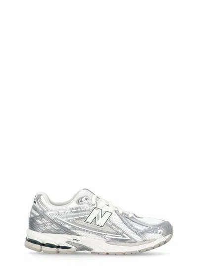 Shop New Balance Sneakers Silver