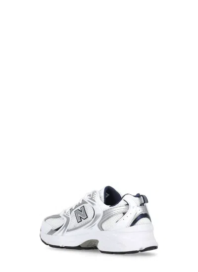 Shop New Balance Sneakers White