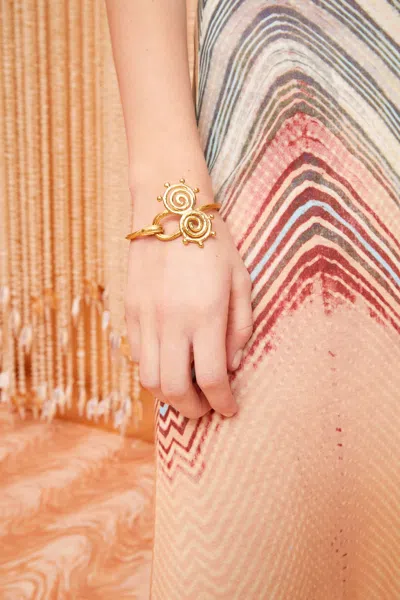 Shop Ulla Johnson Hand Hammered Spiral Bracelet In Brass
