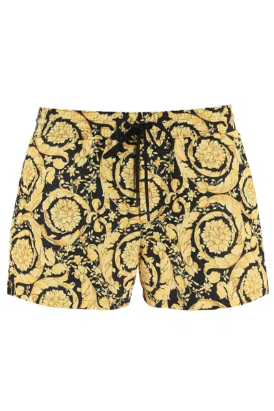 Shop Versace Printed Swim Shorts In Gold