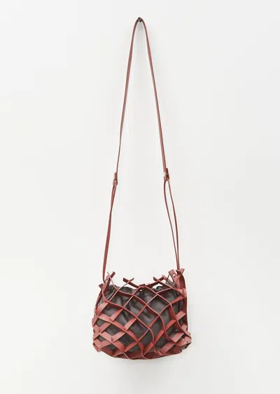 Shop Issey Miyake Cast Net Bag In 44-brown