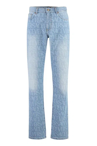 Shop Versace 5-pocket Straight-leg Jeans In Denim