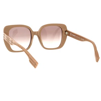 Shop Burberry Sunglasses In Beige