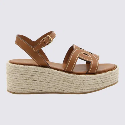 Shop Tod's Brown Leather Kate Sandals