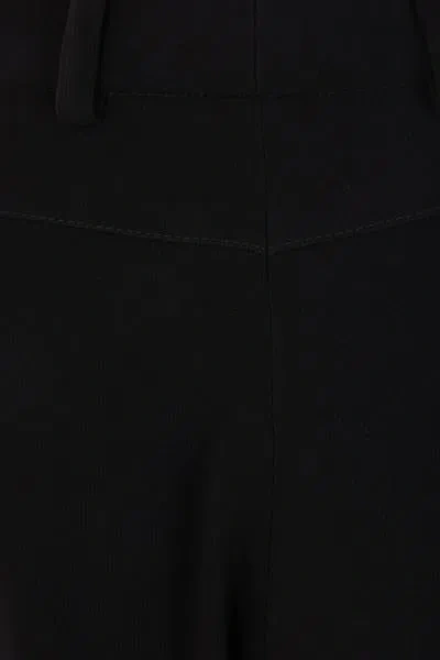 Shop Alberto Biani Trousers In Black