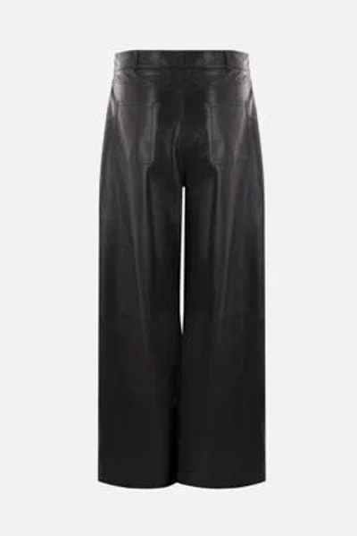 Shop Arma Trousers In Black