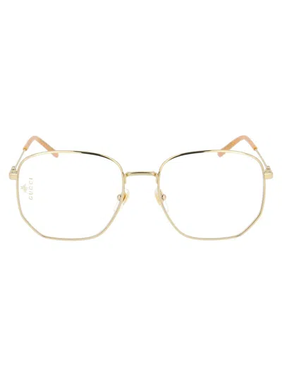 Shop Gucci Sunglasses In 001 Gold Gold Transparent