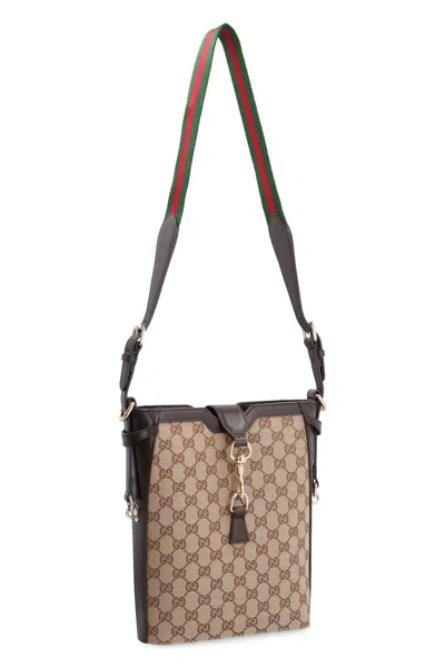 Shop Gucci Canvas Bucket Bag In Beige