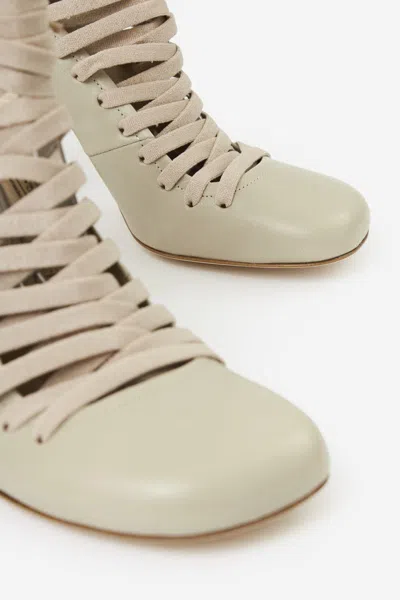 Shop Lemaire Boots In Cream