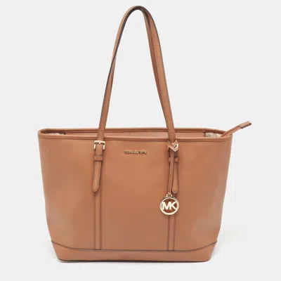 Shop Michael Kors Saffiano Leather Jet Set Travel Tote In Brown