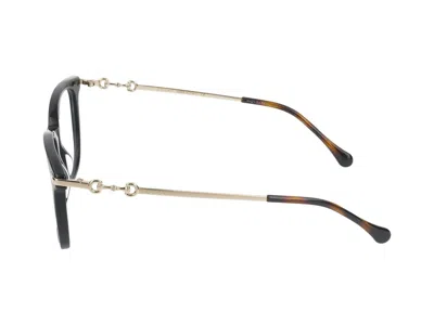 Shop Gucci Eyeglasses In Black Gold Transparent