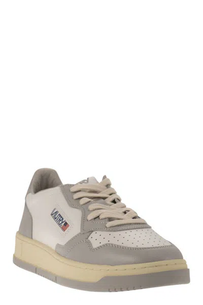 Shop Autry Medalist Low - Bicolor Sneakers In White/grey