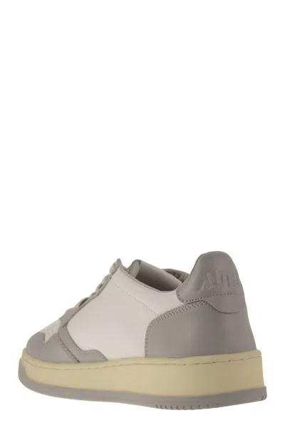 Shop Autry Medalist Low - Bicolor Sneakers In White/grey
