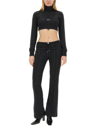 Shop Courrèges Slim Fit Pants In Black