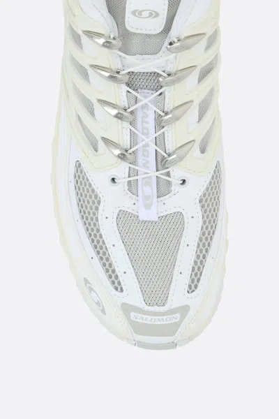 Shop Salomon Sneakers In White