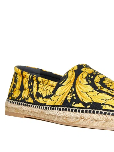 Shop Versace Flat Shoes In Black+gold