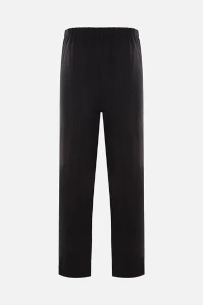 Shop Saint Laurent Trousers In Black