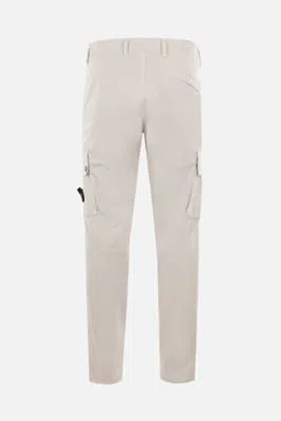 Shop Stone Island Trousers In Plaster