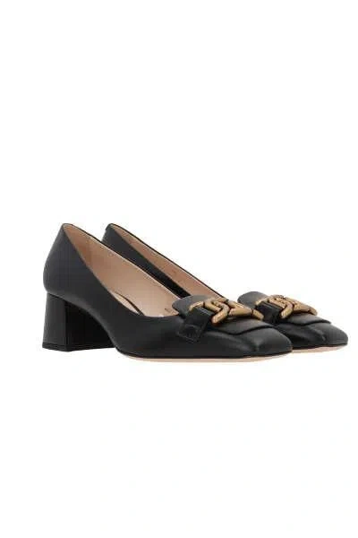 Shop Tod's With Heel In Black