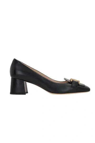 Shop Tod's With Heel In Black
