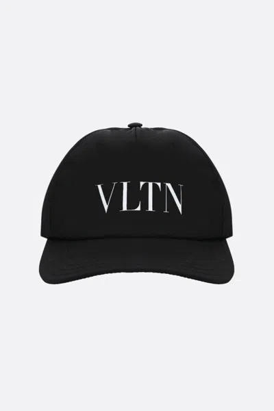 Shop Valentino Garavani Cap In Black
