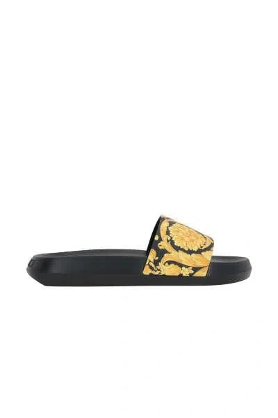 Shop Versace Sandals In Black+gold