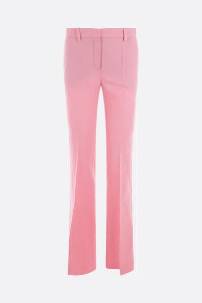 Shop Versace Trousers In Pastel Pink