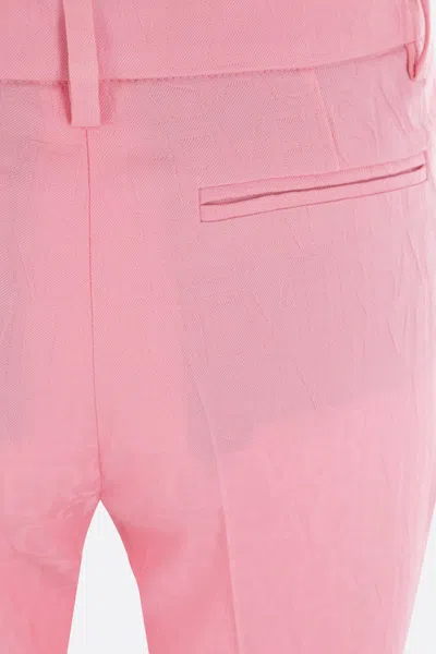 Shop Versace Trousers In Pastel Pink