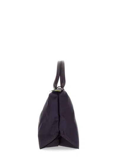 Shop Longchamp Le Pliage Medium Bag In Purple