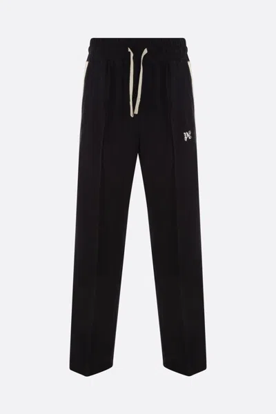 Shop Palm Angels Trousers In Black+off White