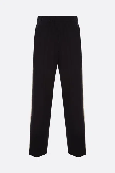 Shop Palm Angels Trousers In Black+off White