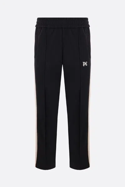 Shop Palm Angels Trousers In Black + White