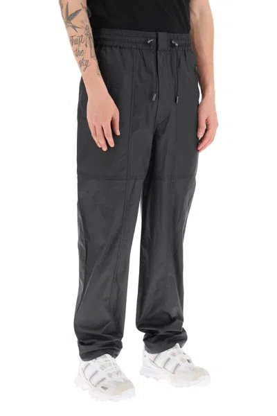 Shop Isabel Marant 'ezra' Coated Cotton Pants Men In Gray