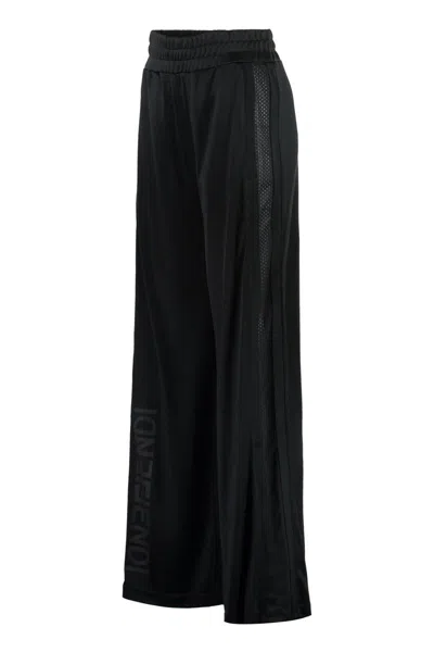 Shop Fendi Contrast Side Stripes Trousers In Black